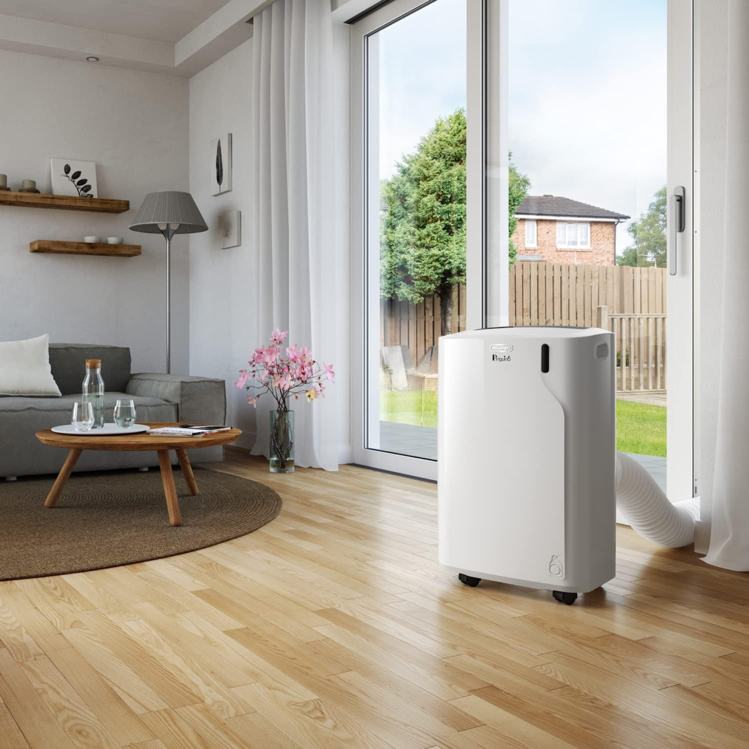 De'Longhi Pinguino PAC EM82, Mobiele airconditioner voor ruimtes tot 80 m, 9.400 BTU, 2,4 kW, 63 dB, Ontvochtigingsfunctie, Energieklasse A, 24-uurs timer, Wit