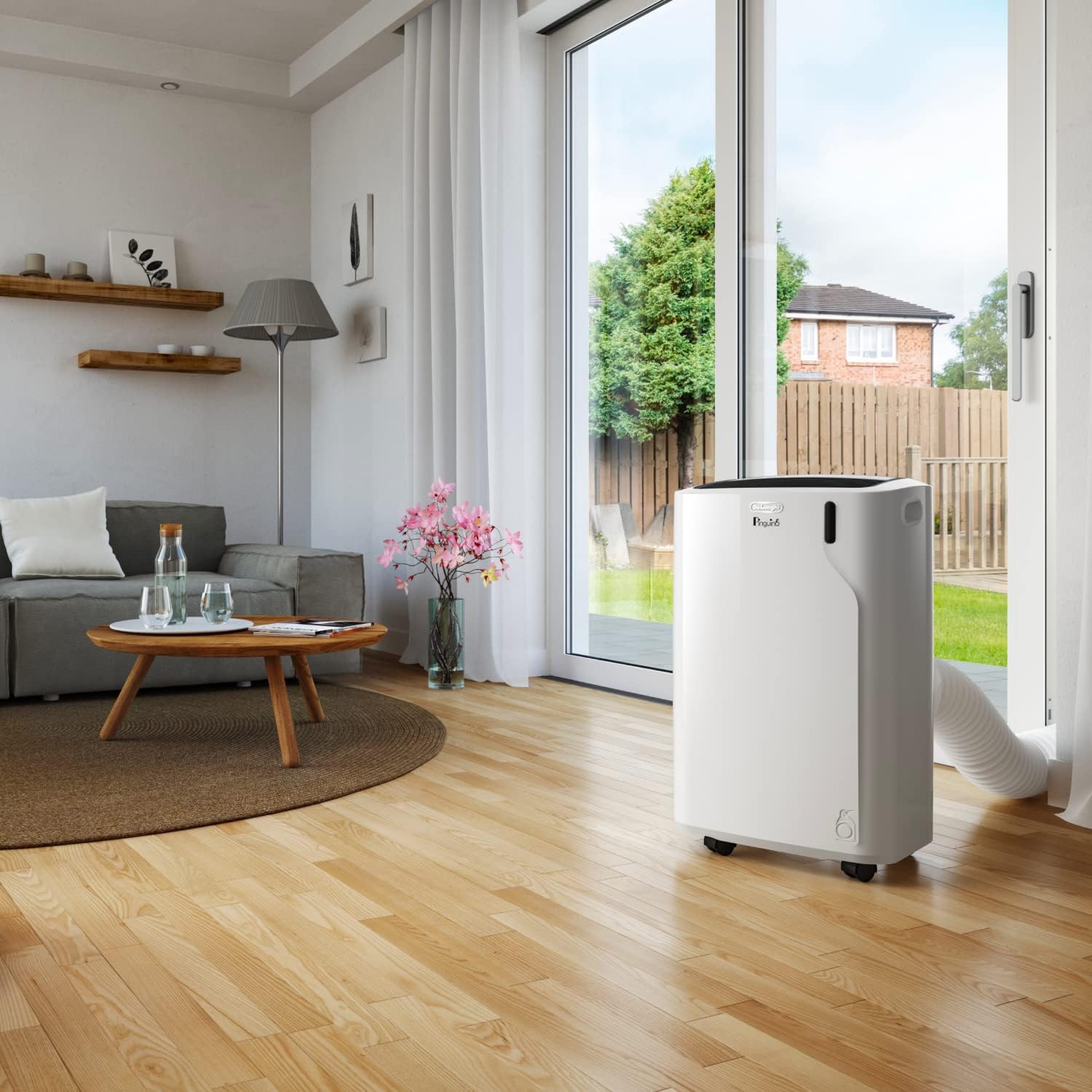 De'Longhi Pinguino PAC EM93 Silent, mobiele airconditioner voor ruimtes tot 90 m³, 10.500 BTU/u, 2,6 kW, 63 dB, ontvochtigingsfunctie, energieklasse A, 24-uurs timer, wit